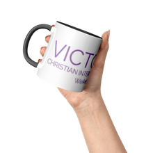Load image into Gallery viewer, 11oz_Black_Accent_Mug_Accent_Mug_Raised_Hand_LH_Mockup.png