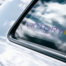 Load image into Gallery viewer, Victory_Bumper_Decals_ClearBumperSticker_CarWindow_Mockup.png